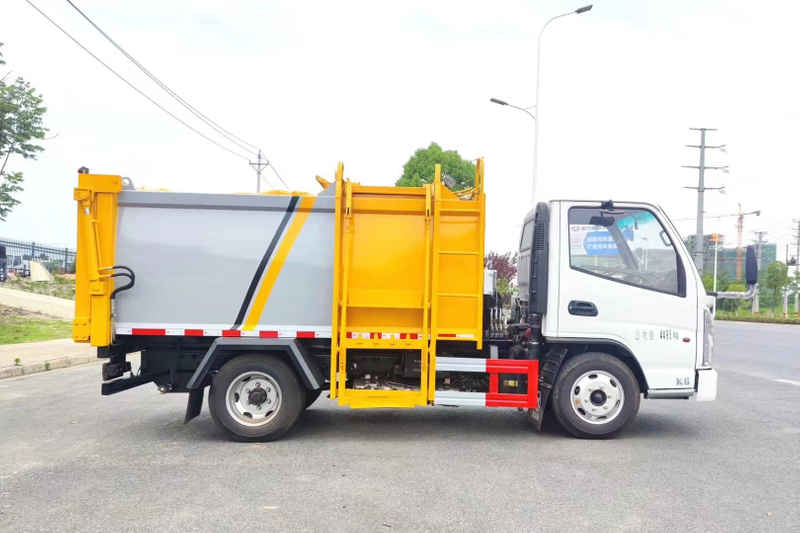 Trak Sampah Jenis Side Hang Up untuk Pengangkutan